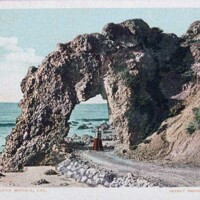 A_woman_in_front_of_Arch_Rock_just_south_of_Topanga_Canyon_Calif ps.jpg